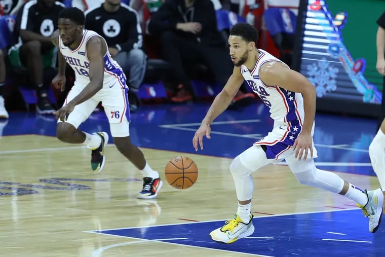Ben Simmons (right) leads a fastbreak against the Celtics during a preseason game last week. Shake Milton is following.