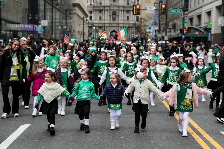 Dancers from the McDade-Cara School of Irish Dance travel down Market Street during the 2023 St. Patrick’s Day Parade in Philadelphia. This year's parade will take place Sunday, March 10.