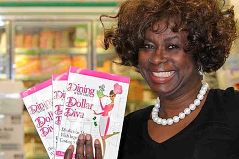 Elizabeth Fisher and her new cookbook, 'Dining With the Dollar Diva,' at a Dollar Tree store on City Avenue. (Clem Murray/Staff)