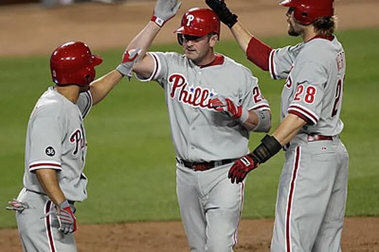Brian Schneider hit a three-run homer in the second inning to spark the Phillies. (Jae C. Hong/AP)