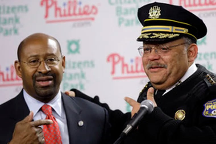 Mayor Nutter and Police Commissioner Charles H. Ramsey at a news conference. Nutter said police were studying videos to identify those responsible for &quot;idiotic, destructive behavior.&quot;