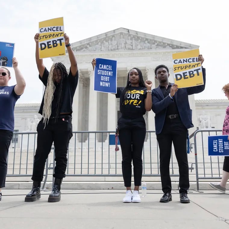 Student loan protesters demonstrate outside the U.S. Supreme Court.