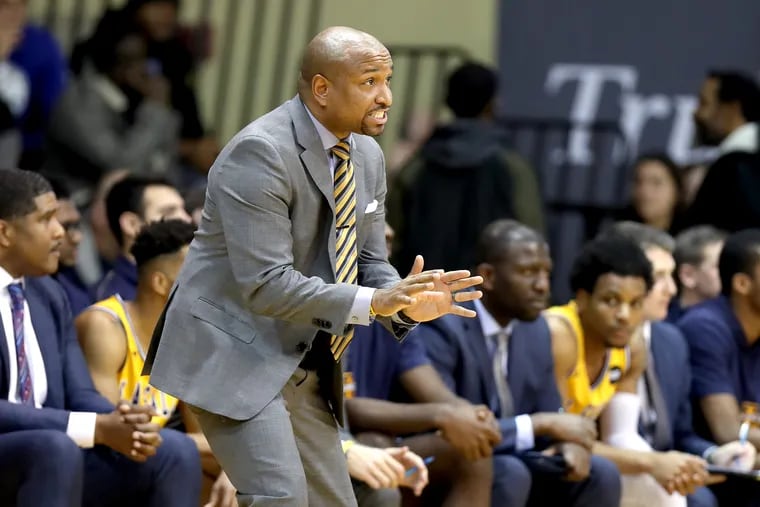 Coach Ashley Howard of La Salle tells his team to slow down against Penn at Tom Gola Arena on Dec. 8, 2018.    CHARLES FOX / Staff Photographer