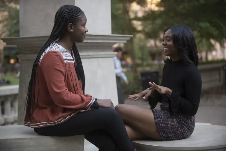 Kerri Heard, a 21-year-old Drexel student, is interviewed by Kyshon Johnson in Rittenhouse Square.