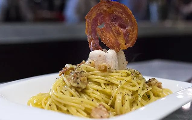 Try the carbonara with bacon gelato at Gran Caffee L'Aquila.