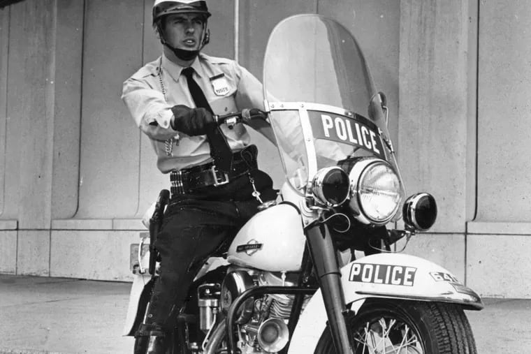 Officer Tommy Gibbons of the Philadelphia Highway Patrol on his Harley-Davidson in 1970. He became a journalist after he was critically wounded in a 1970 ambush. A new Harley will be presented to the Highway Patrol in his name.