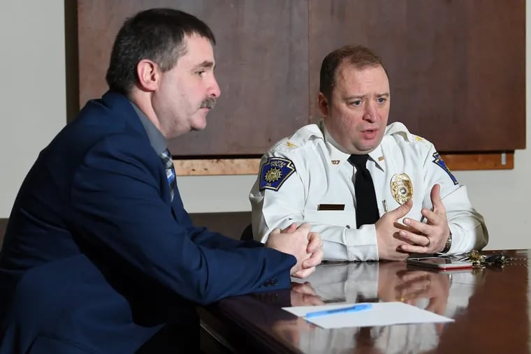 Chester Police Capt. James Chubb, left, and Chester Police Chief James Nolan speak to The Philadelphia Inquirer during an interview at the Chester Police Department in Chester, Pa. Tuesday, Feb. 6, 2018. The department said they've seen an increase in crimes that link OfferUp, Ebay and Craigslist. JOSE F. MORENO / Staff Photographer