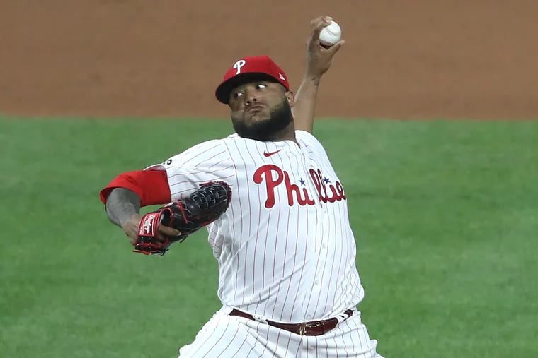 José Alvardo of the Phillies came on in the ninth inning to earn the save against the Brewers.