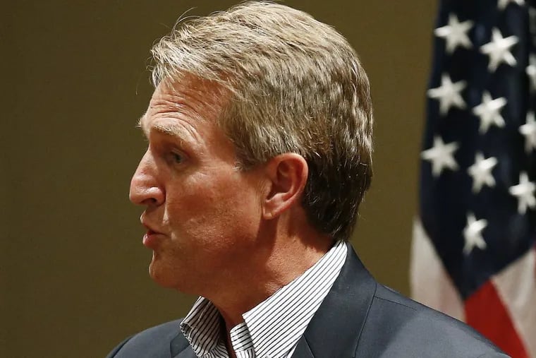 Sen. Jeff Flake (R-Ariz.) answers a question as he speaks to members of the Glendale (Ariz.) Chamber of Commerce on Tuesday.