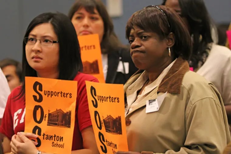 Supporters of Stanton Elementary School did not like what they heard in the School District Auditorium Wednesday.  Stanton Elementary is one of nine schools that the School District is proposing to close.  ( Michael Bryant / Staff photographer )