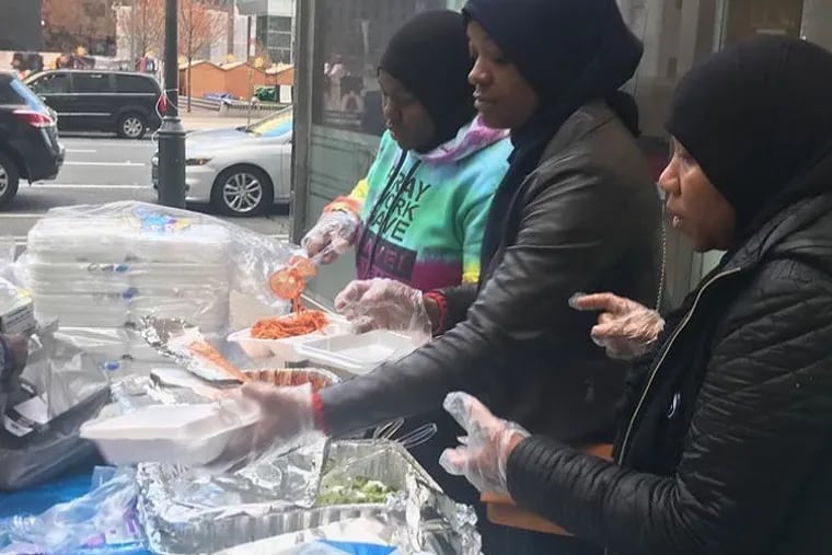 Ayisha Sims (far right), founder of Ummah of Philly, feeds the homeless on the last Sunday of every month and has been at it for years.