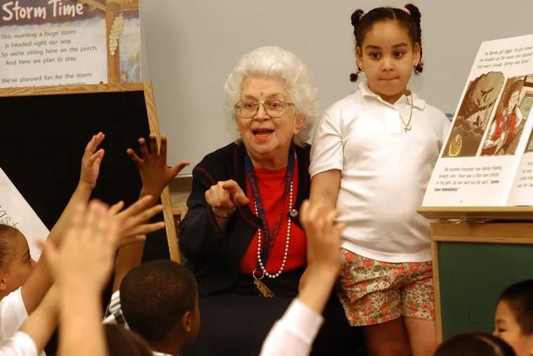 Dr. Nolan is shown here with her first-grade students at Laura Carnell Elementary School in 2003. She retired three days later.