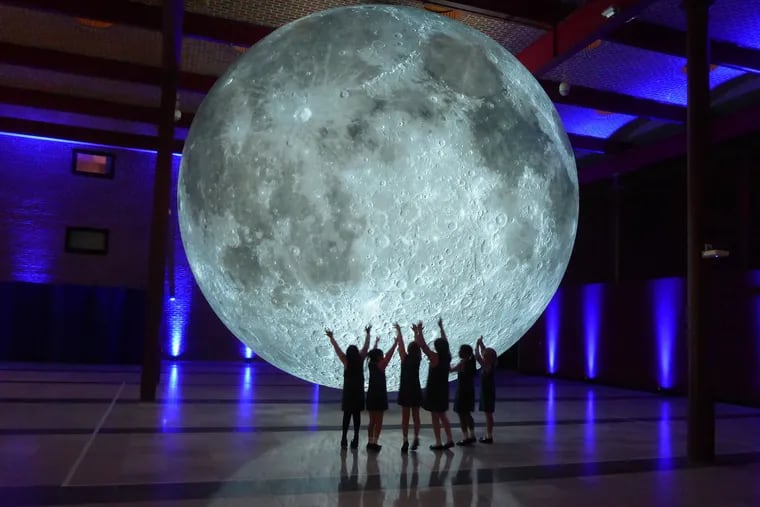 Attendees at the Franklin Institute's Museum of the Moon installation in 2019.