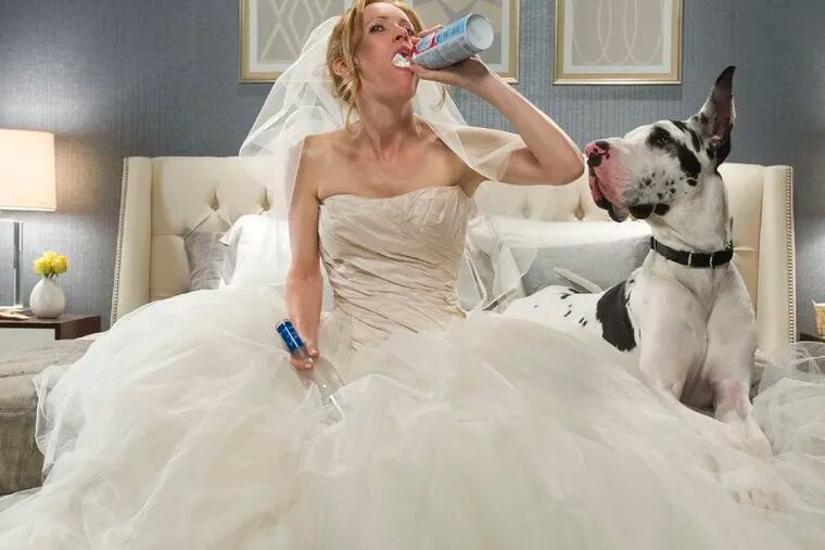THE OTHER WOMAN: Betrayed be her straying hubby, Kate (Leslie Mann) takes solace in some whipped cream, a lavish hotel room, and an attentive pooch. Photo Credit: Barry Wetcher - TM and � 2013 Twentieth Century Fox Film Corporation.
