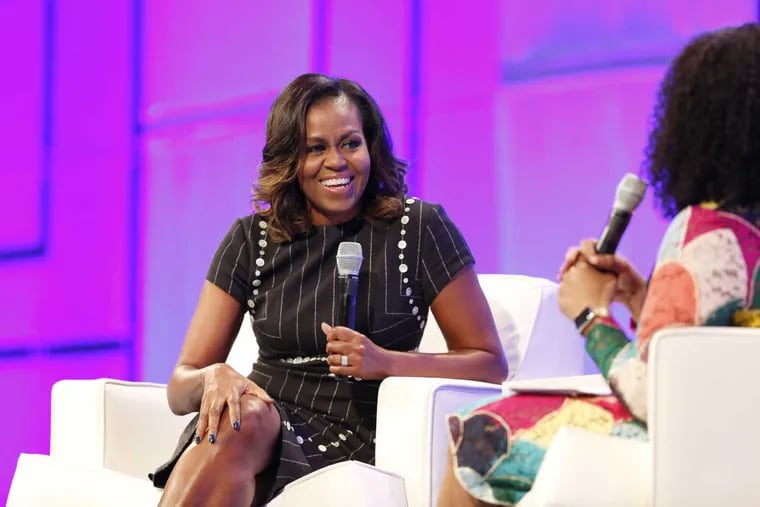 Former First Lady of the United States Michelle Obama and Screenwriter, director and producer Shonda Rhimes speak on stage during Pennsylvania Conference For Women 2017 at Pennsylvania Convention Center on Oct. 3, 2017 in Philadelphia, Pennsylvania.