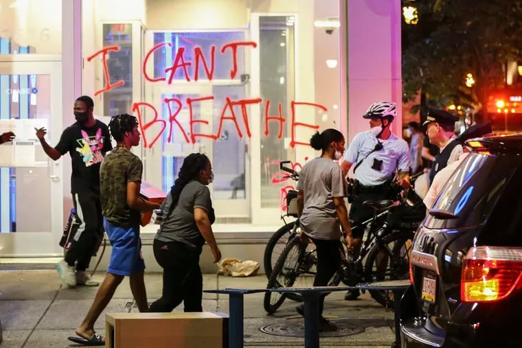"I Can't Breathe" on the Chase Bank window at 17th and Walnut Streets in Center City Philadelphia on Saturday.