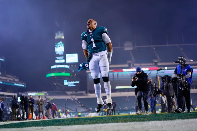 Philadelphia Eagles quarterback Jalen Hurts celebrates as he leaves the field after his best game as a pro.