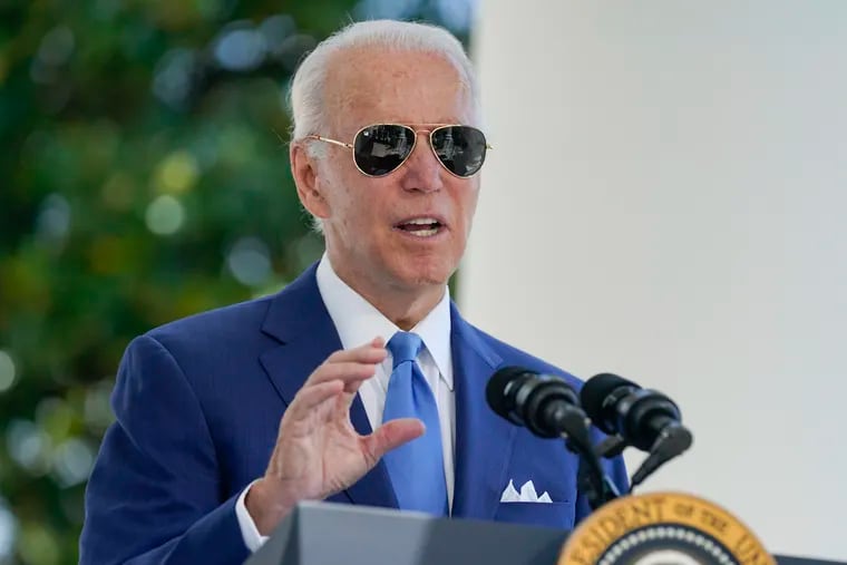 President Joe Biden speaks before signing two bills aimed at combating fraud in the COVID-19 small business relief programs Friday at the White House in Washington.
