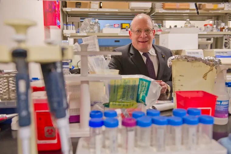 Garth Ehrlich, a virologist at Drexel University College of Medicine, catalogs the various pathogens in the brain as part of an effort to explore what role germs might play in the development of Alzheimer's disease.