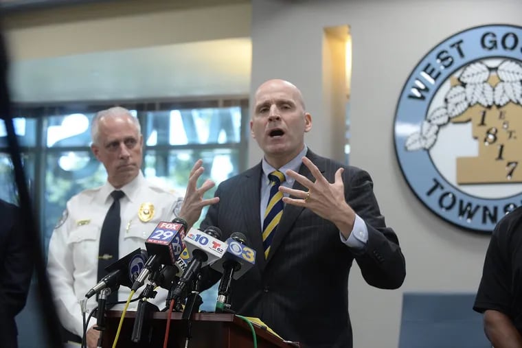 West Goshen Police Chief Joseph Gleason (left) stands by as Chester County District Attorney Thomas Hogan  conducts a news conference to discuss the arrest of suspected shooter David Desper, of Trainer, Pa. in the death of Bianca Roberson.