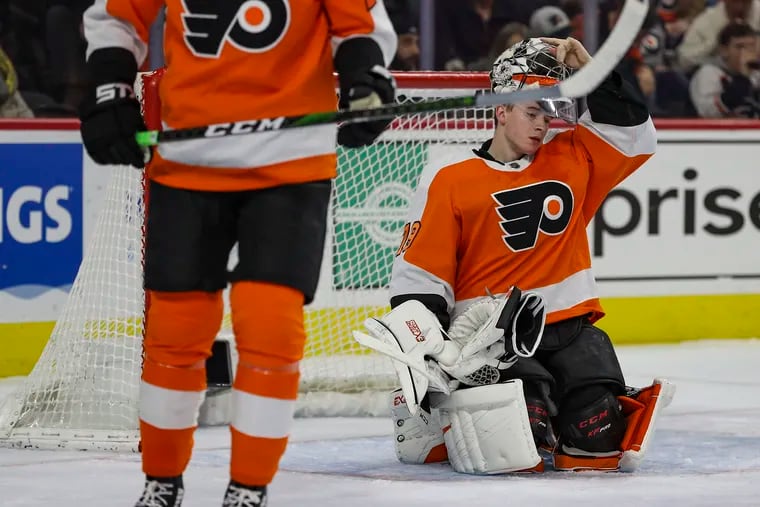 Flyers goalie Carter Hart (79) reacts after a save in the second period of a game against the Winnipeg Jets at the Wells Fargo Center on Saturday, Feb. 22, 2020.