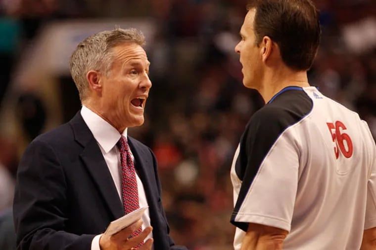 Brett Brown pleads with an official. (Ron Cortes/Staff Photographer)
