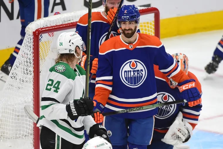 Evan Bouchard #2 of the Edmonton Oilers exchanges words with Roope Hintz #24 of the Dallas Stars during the third period of Game Four of the Western Conference Final of the 2024 Stanley Cup Playoffs at Rogers Place on May 29, 2024, in Edmonton, Alberta, Canada. (Photo by Leila Devlin/Getty Images)