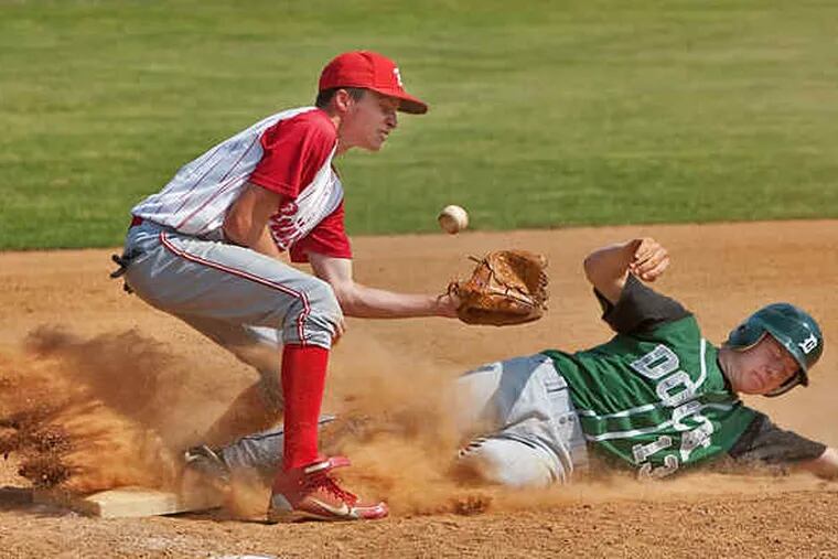 Christopher Dock's Andrew Gordon slides safely into third as Bristol's Ryan Lawrence tries to come up with the ball.