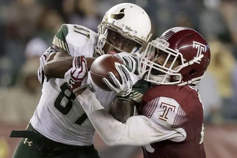 Temple’s Delvon Randall (right), here defending a pass against South Florida last season, is confident that the Owls secondary will rebound.