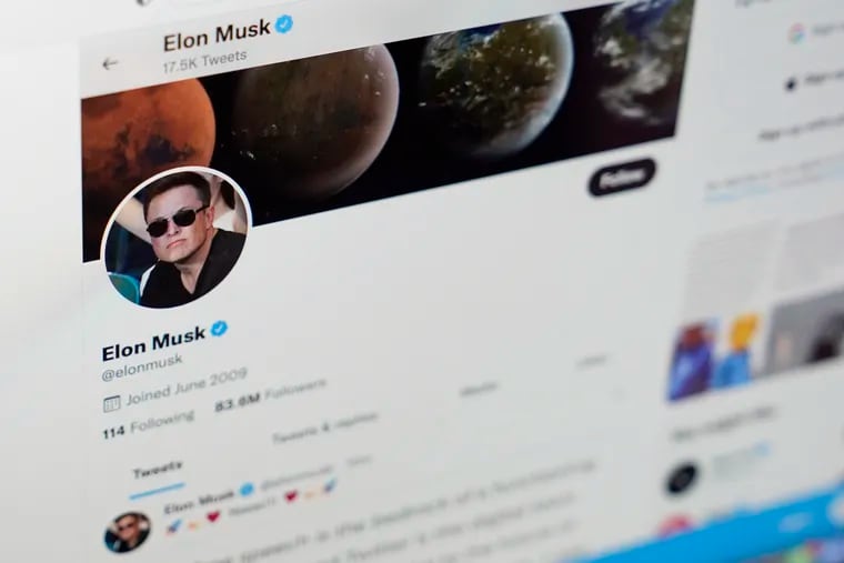 The Twitter page of Elon Musk is seen on the screen of a computer in Sausalito, Calif. On Monday, Musk reached an agreement to buy Twitter for about $44 billion.