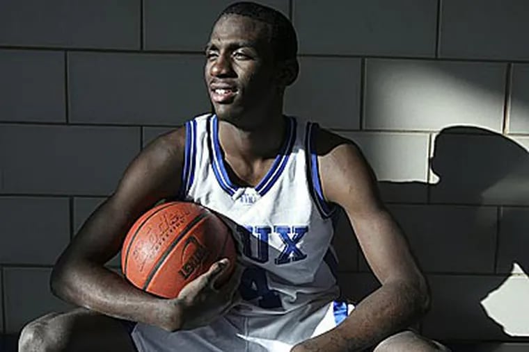 Vaux star junior basketball player Rysheed Jordan has received offers from St. John's, Syracuse, UCLA and Temple. (Steven M. Falk/Staff Photographer)
