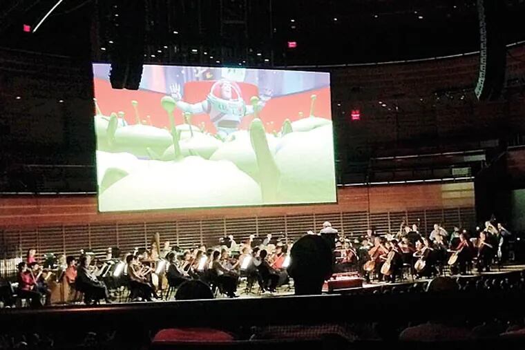 The Philadelphia Orchestra prsents an ensemble accompanying a fantasia of Pixar movie moments. (Photo credit: The Philadelphia Orchestra)