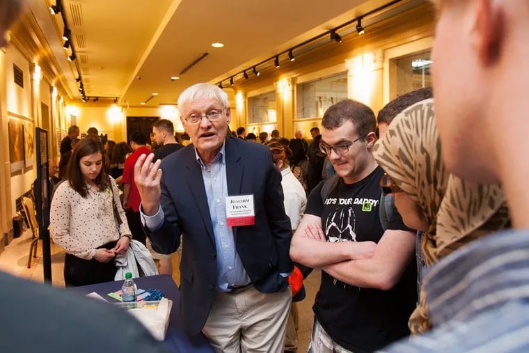 In this 2014 file photo at the Franklin Institute, eminent scientist and Franklin Institute award winner Columbia University’s Dr. Joachim Frank talks to students from the Science Leadership Academy. Frank is credited with the development of Cryo-Electron Microsopy.