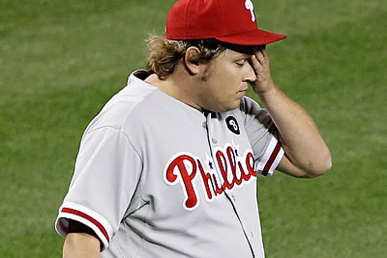 The Phillies fell out of first place in the NL East thanks to last night's loss to the Diamondbacks. (Matt York/AP)