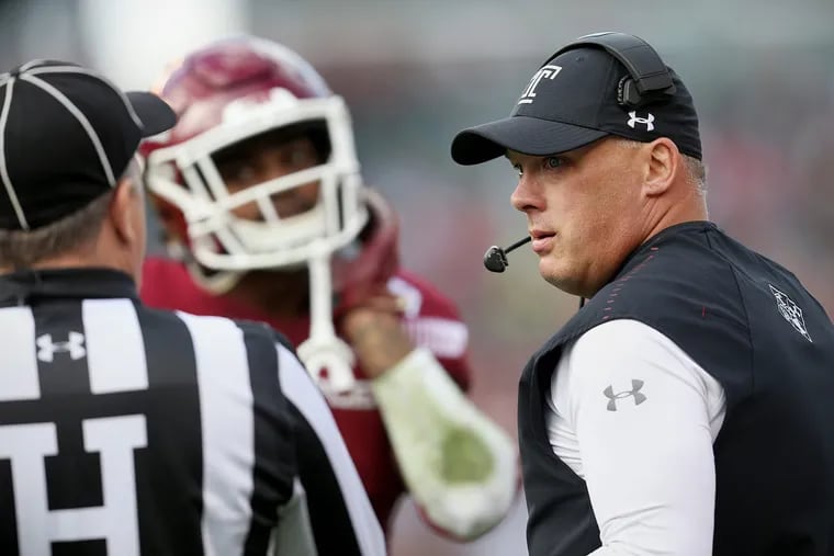 Temple head coach Geoff Collins talks to an official during a game against Cincinnati at Lincoln Financial Field in South Philadelphia on Saturday, Oct. 20, 2018. Temple won 24-17 in overtime. TIM TAI / Staff Photographer