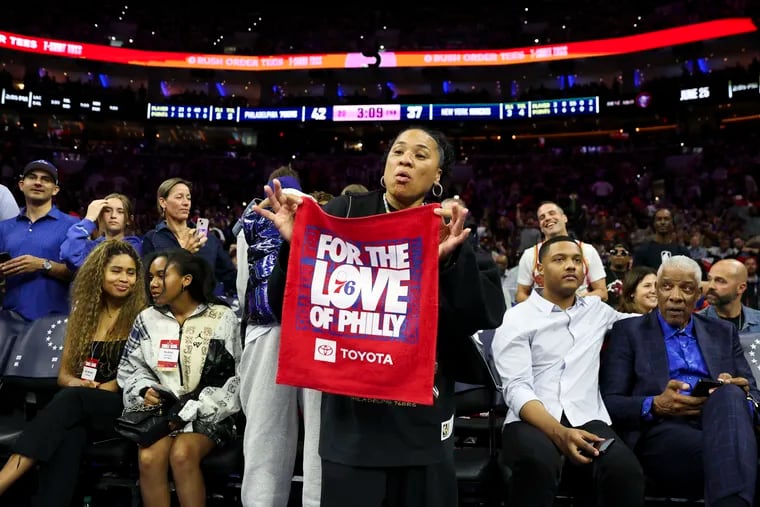 Philly native Dawn Staley (center) is urging Sixers fans not to sell their tickets for Game 6 at the Wells Fargo Center.