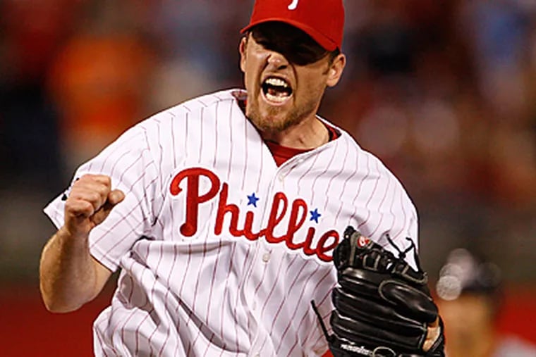 Brad Lidge reacts after striking out Adam Dunn to end the game. (Ron Cortes/Staff Photographer)