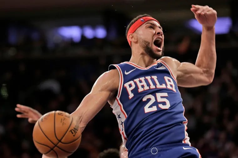 Ben Simmons reacts after a dunk against the Knicks on Sunday.