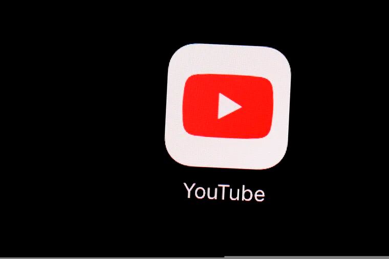FILE - This March 20, 2018, file photo shows the YouTube app on an iPad in Baltimore. Google's video site YouTube has been fined $170 million to settle allegations it collected children's personal data without their parents' consent. The Federal Trade Commission fined Google $136 million and the company will pay an additional $34 million to New York state to resolve similar allegations. (AP Photo/Patrick Semansky, File)