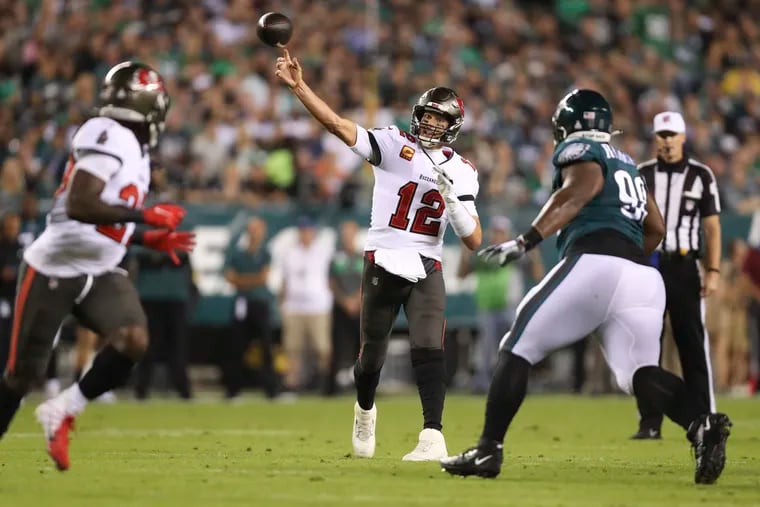 Tampa Bay Buccaneers quarterback Tom Brady throws a passl against the Eagles during the first quarter on October 14, 2021 in Philadelphia.
