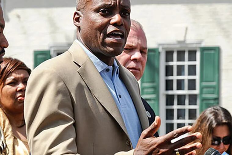 Olympic gold-medalist Carl Lewis will be on the ballot for the state primary, but maybe not for the general election. (Ron Tarver / Staff Photographer)