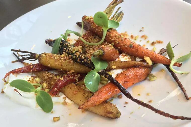 Roasted baby carrots with yogurt, chipotle pepper, honey, pistachios and toasted quinoa from Bank & Bourbon.