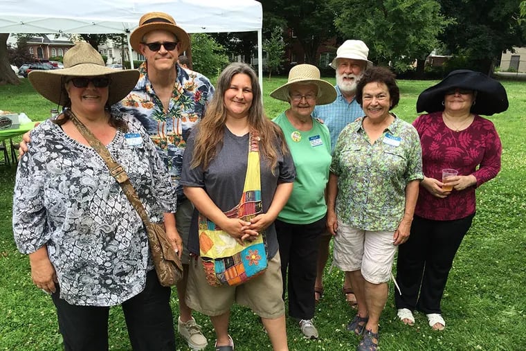 Diane Kunze (left) with her fellow Friends of Overington Park a/k/a FOOPers, a group of dedicated gardeners who took it upon themselves to spruce up the area. (DAN GERINGER/DAILY NEWS STAFF)