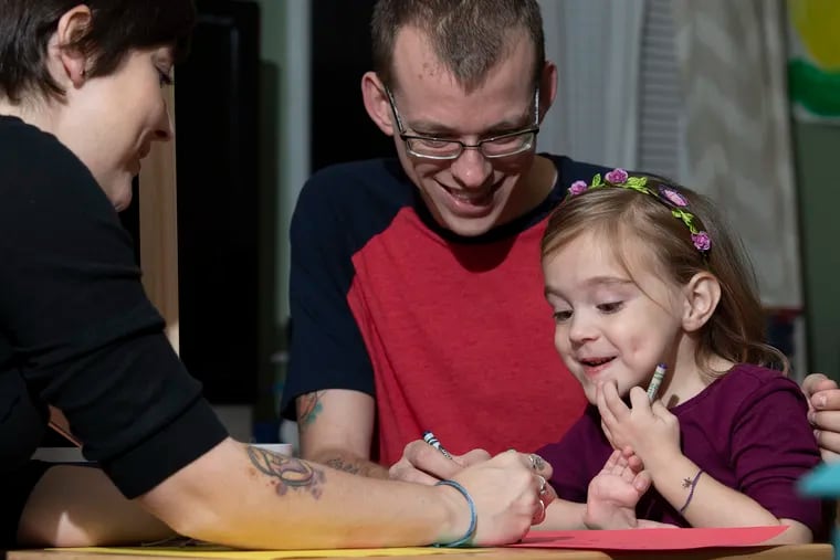 Havertown 4-year-old Scarlett Camburn lost the use of her right arm two years ago due to a condition called acute flaccid myelitis. Surgery at Children's Hospital of Philadelphia restored much of the arm's function but she still can't make a fist.