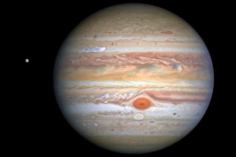 Jupiter, as seen by  NASA’s Hubble Space Telescope. You probably won't get this good a view, but you might see a few of Jupiter's moons with decent binoculars.