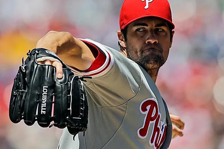 Cole Hamels, the face of a disappointing Phillies season almost one-third completed, refuses to admit frustration. (Alex Brandon/AP)