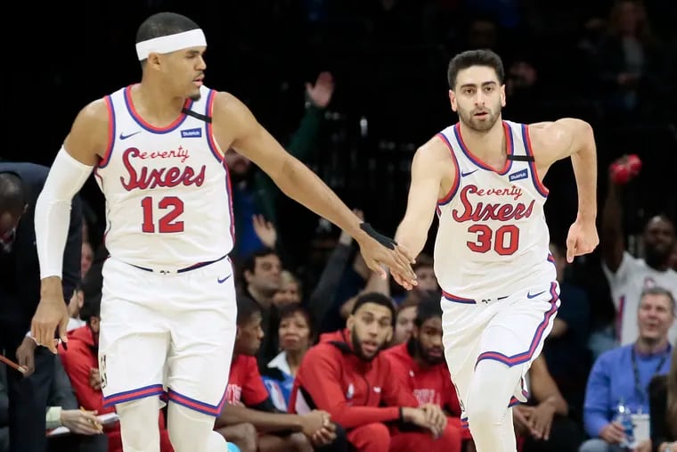 Furkan Korkmaz (right) scored a career-high 24 points in the Sixers' win over Chicago Friday night.
