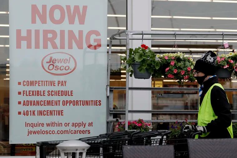 America’s employers sharply scaled back their hiring last month as the viral pandemic accelerated across the country.