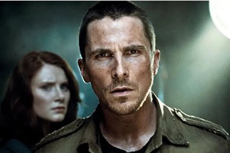 In this film publicity image released by Warner Bros., Bryce Dallas Howard, left, and Christian Bale are shown in a scene from, "Terminator Salvation." (AP Photo/Warner Bros.)