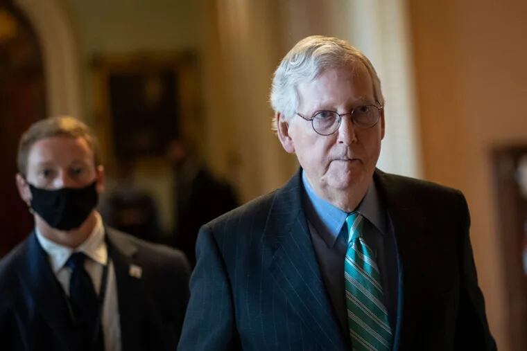 Senate Minority Leader Mitch McConnell, R-Ky., returning to his office after a lunch meeting with Senate Republicans at the U.S. Capitol on Thursday.